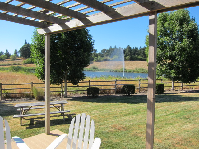 Large guest house at Stoller Vineyards sleeps 8, and includes this outdoor deck overlooking one of the ponds on the property.